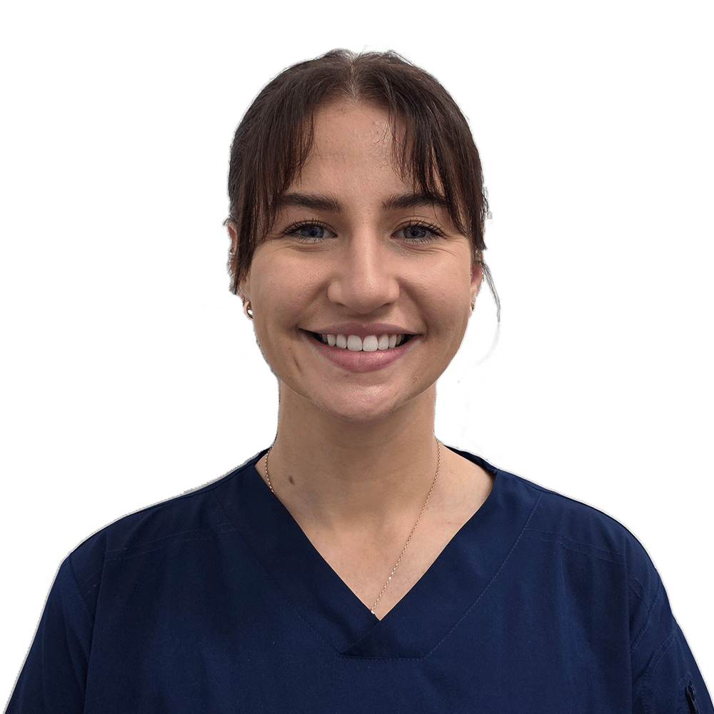 Headshot of Liz, smiling and wearing navy scrubs, part of the Skygate Dental team.